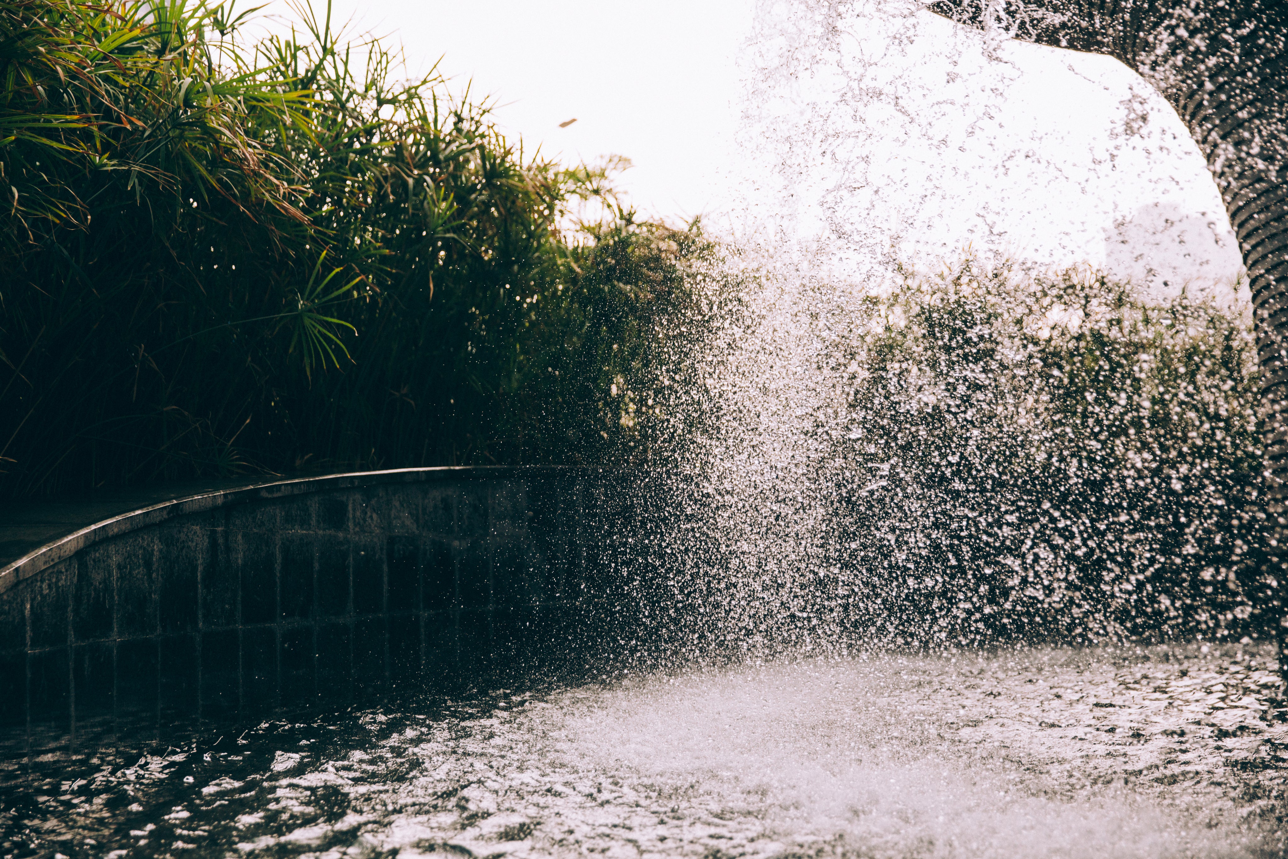 cascading-water-splashes-into-a-fountains-pool.jpg